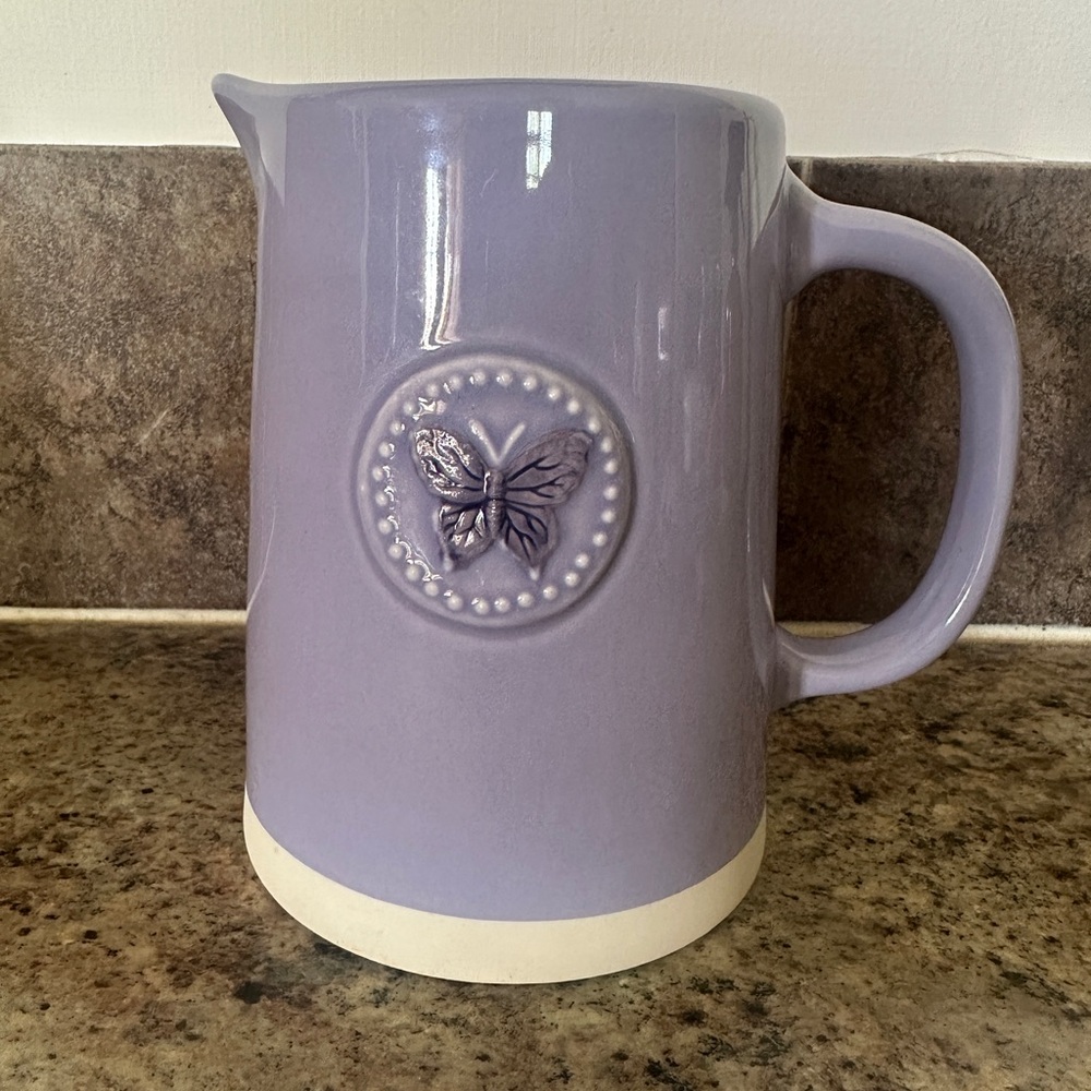 Sweetest Flutter Lavender Ceramic Pitcher with Butterfly Design by Tele Flora